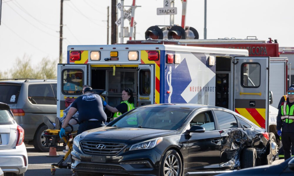 Woman hospitalized in 2-car crash near Walmart