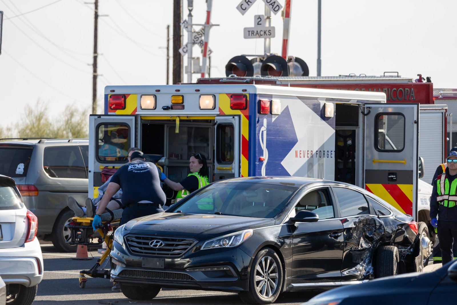 Woman hospitalized in 2-car crash near Walmart