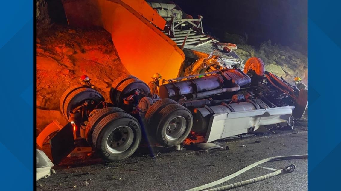 Fire crews rescue person trapped in semi-truck after rollerover crash on I-40