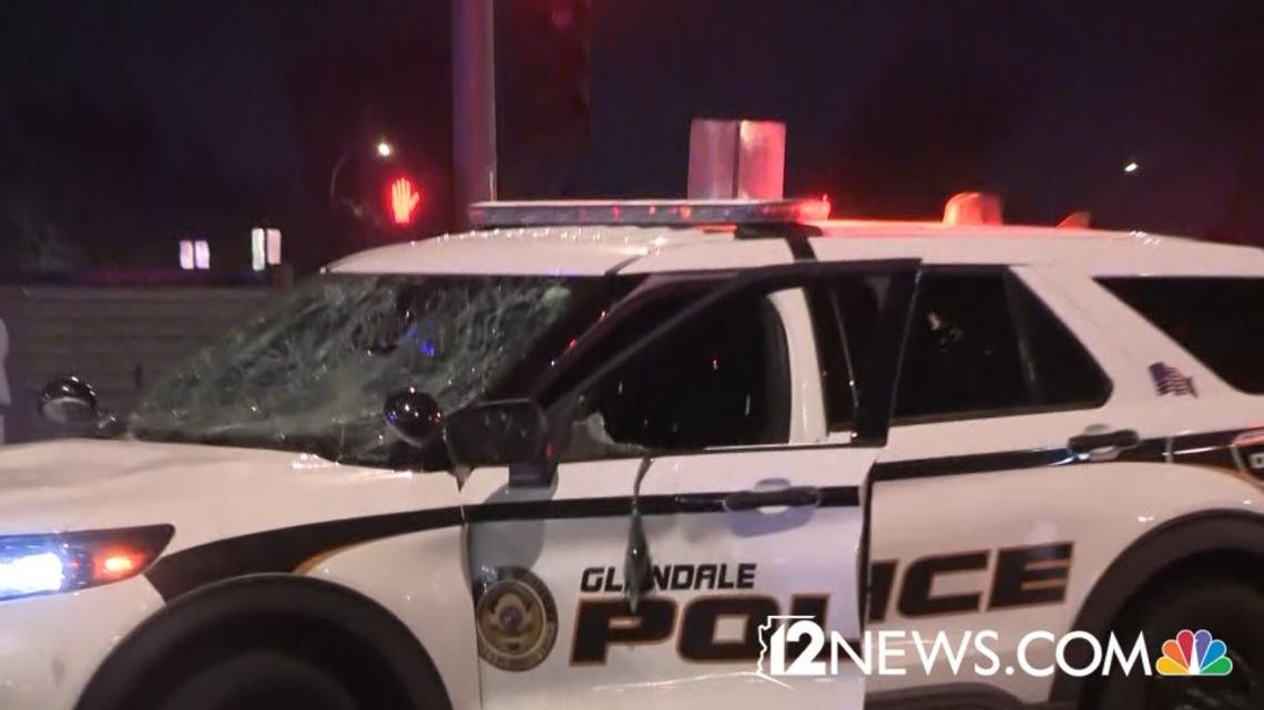 Immigration rights protests continue in West Valley after police say individual jumped into police car, drove vehicle a short distance