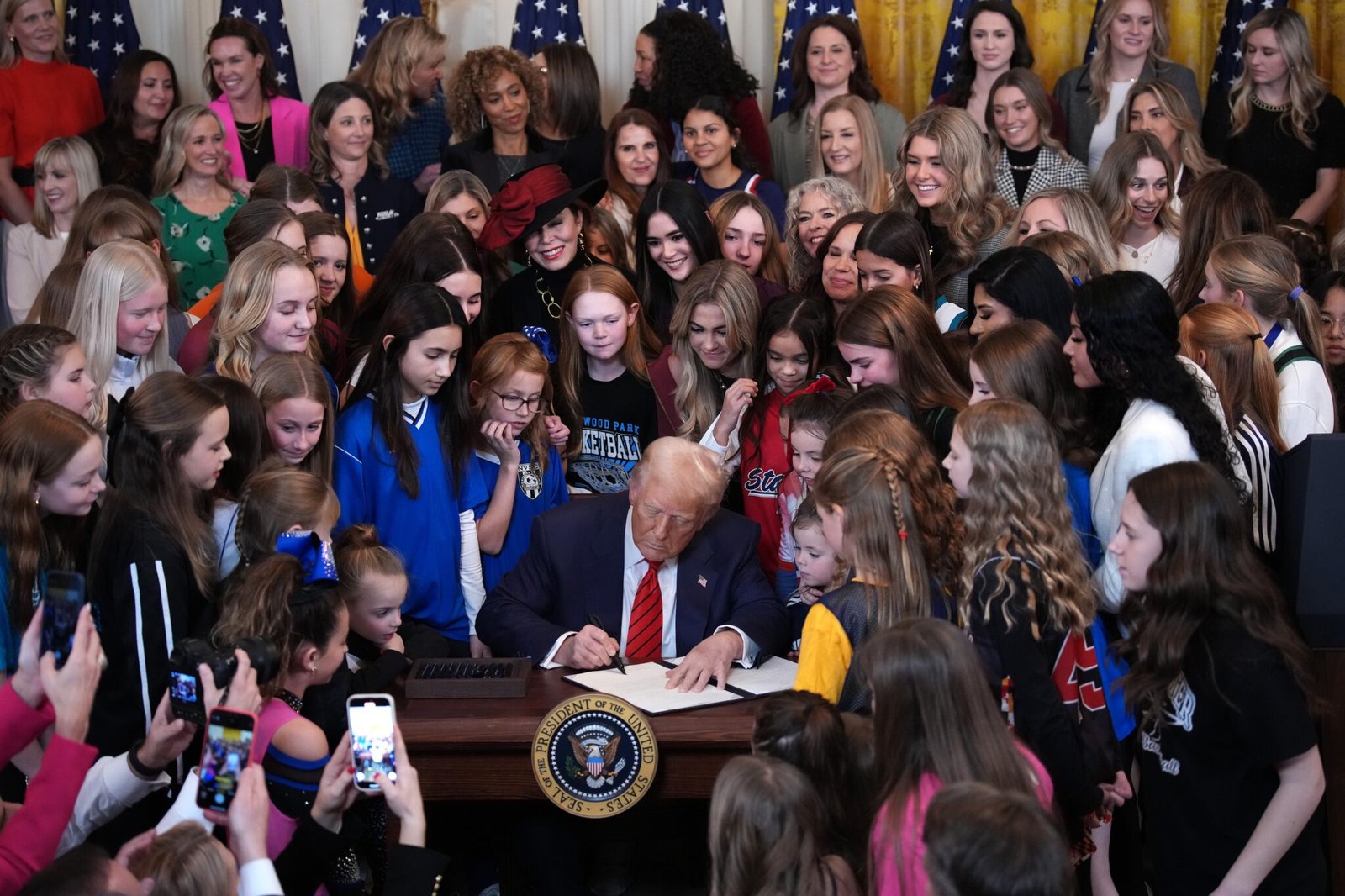 President Donald Trump signs the “Keeping Men Out of Women's Sports" executive order in the East Room at the White House on Feb. 5, 2025, in Washington, D.C. (Photo by Andrew Harnik/Getty Images)