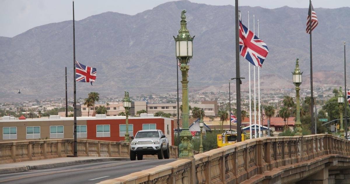 Why are U.S. flags at half staff in Arizona on Friday?