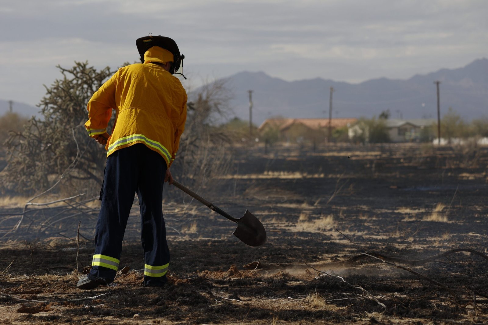 Large, uncontrolled eastside brushfire spreads to vehicles