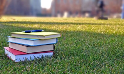 books on campus lawn