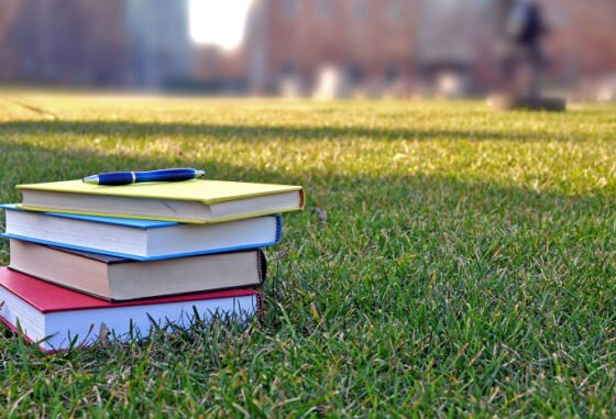 books on campus lawn