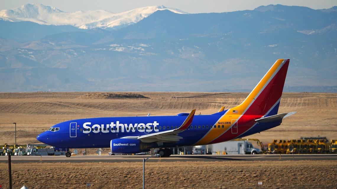 When will Southwest Airlines start charging for checked bags?