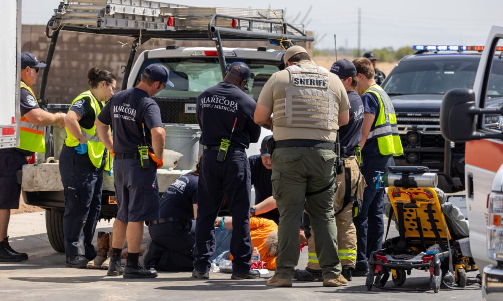 Construction worker hospitalized after being hit by car