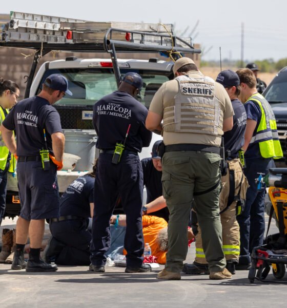 Construction worker hospitalized after being hit by car