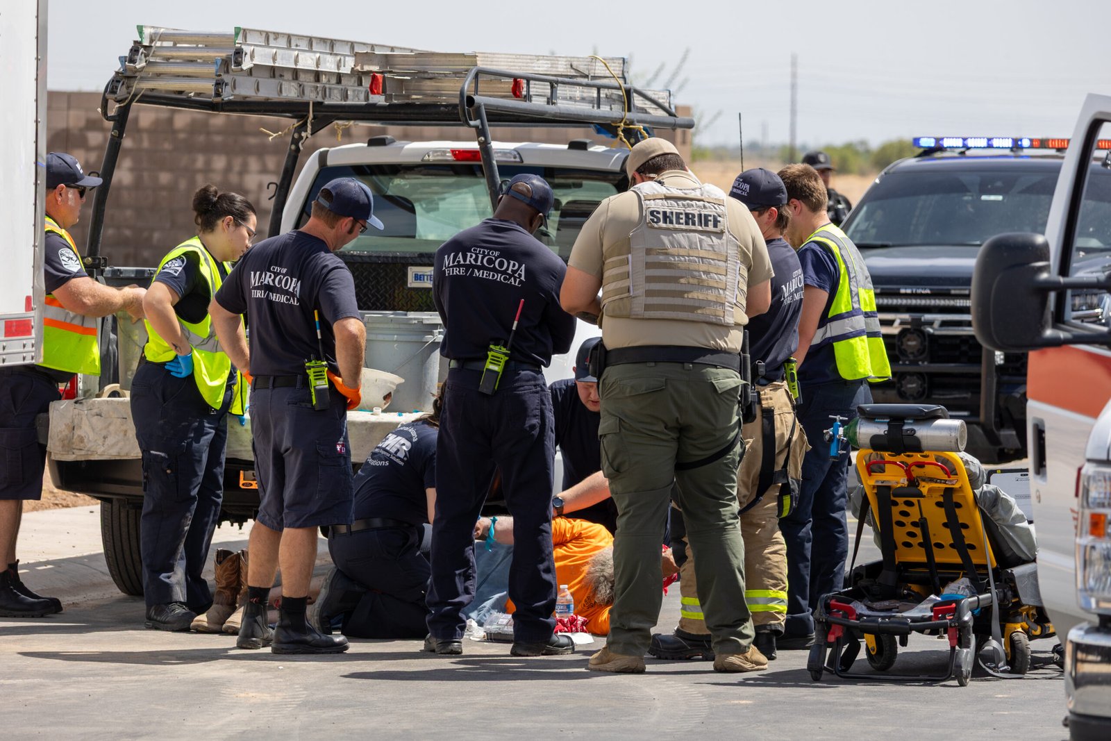 Construction worker hospitalized after being hit by car