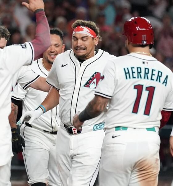 Naylor hits grand slam in 11th and Diamondbacks recover to beat Mariners 8-4