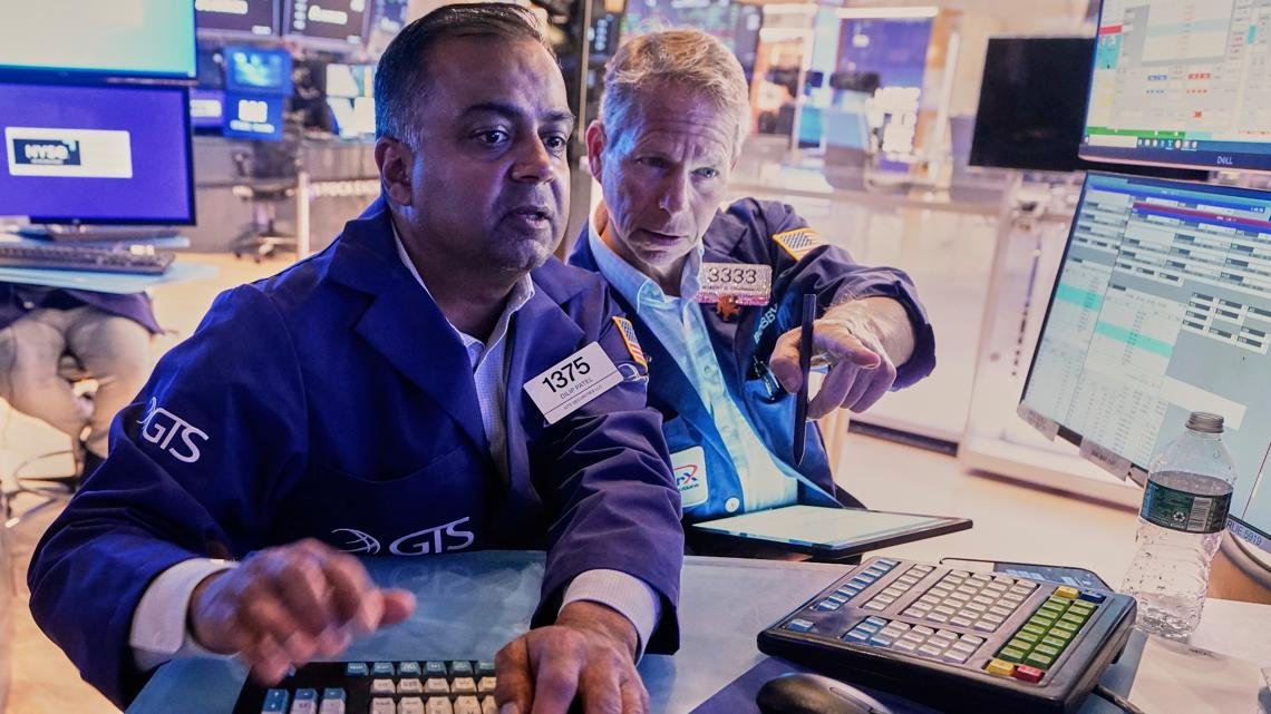 US stocks hang near their record as Wall Street takes a breath following two big days
