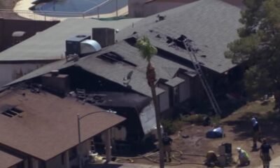 1 injured, 8 displaced in double house fire