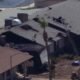 1 injured, 8 displaced in double house fire