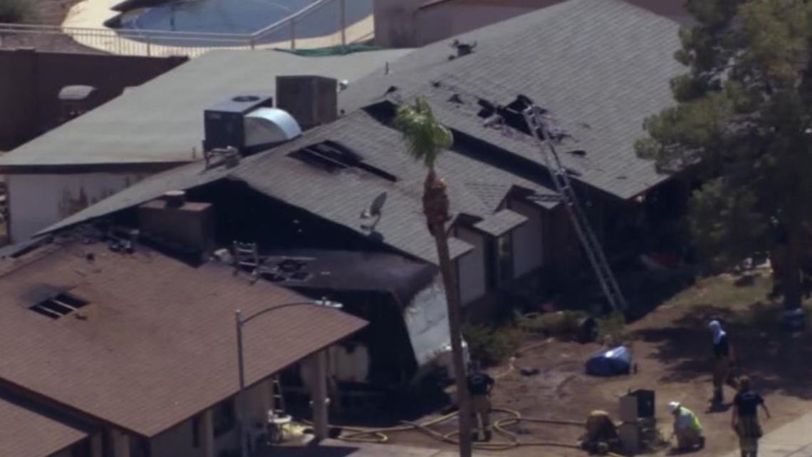 1 injured, 8 displaced in double house fire