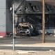 1 dead, 1 injured after vehicle fleeing traffic stop crashes into building, catches fire