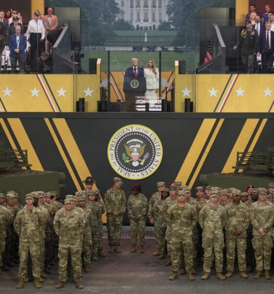U.S. President Donald Trump and first lady Melania Trump stand together at the end of the U.S Army parade on June 14, 2025 in Washington, D.C. (Photo by Andrew Harnik/Getty Images)