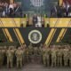 U.S. President Donald Trump and first lady Melania Trump stand together at the end of the U.S Army parade on June 14, 2025 in Washington, D.C. (Photo by Andrew Harnik/Getty Images)