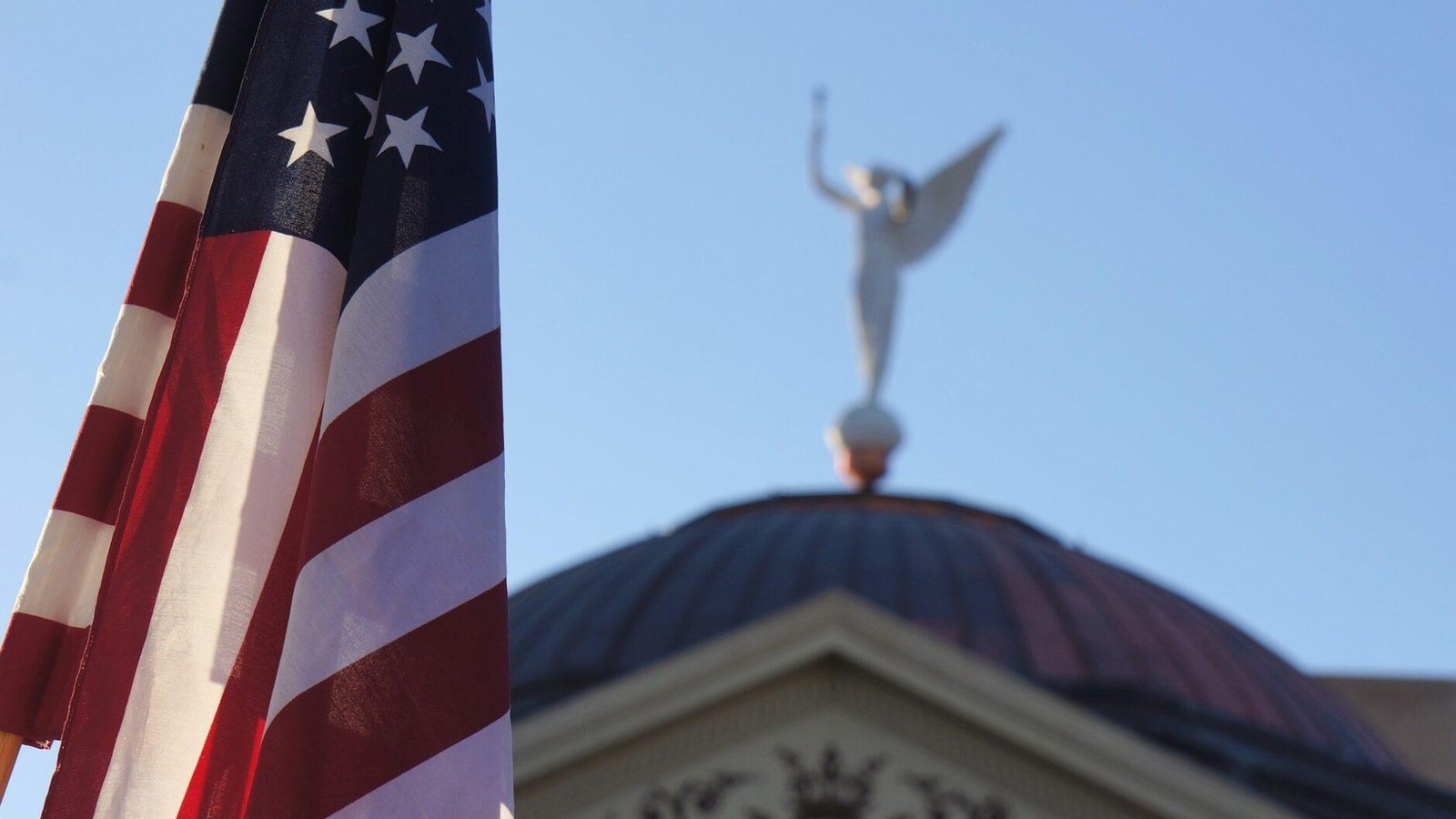 DOJ warns Arizona & Wisconsin over compliance with federal election law