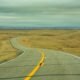 A ribbon of highway stretching to the horizon in North Dakota. (Photo by Getty Images)