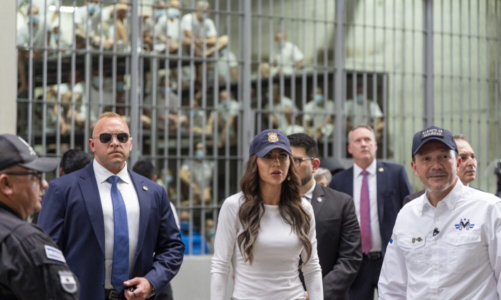 Minister of Justice and Public Security Héctor Villatoro, right, accompanies Homeland Security Secretary Kristi Noem during a tour of the Centro de Confinamiento del Terrorismo, or CECOT, on March 26, 2025. (Photo by Alex Brandon-Pool/Getty Images)