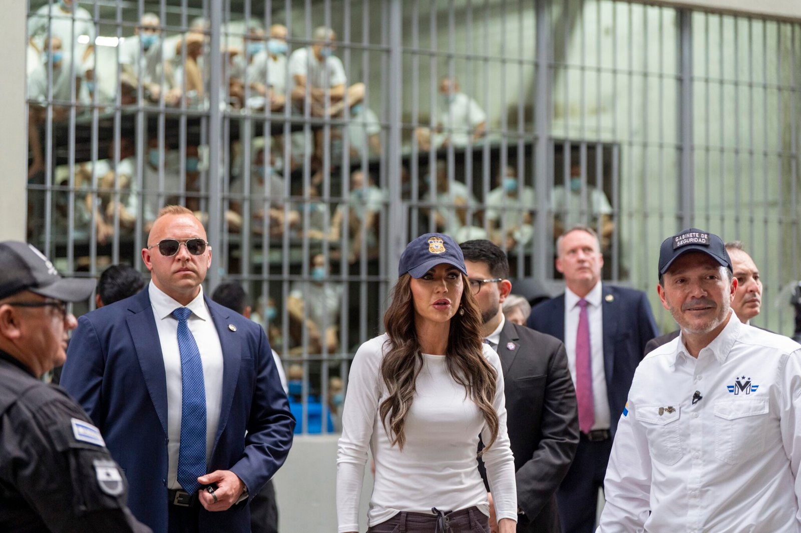 Minister of Justice and Public Security Héctor Villatoro, right, accompanies Homeland Security Secretary Kristi Noem during a tour of the Centro de Confinamiento del Terrorismo, or CECOT, on March 26, 2025. (Photo by Alex Brandon-Pool/Getty Images)