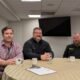 From left to right, Chase Christie, development director for Alaska Solar LLC, Josh Craft, managing partner of Wasilla, Alaska-based Crafty Energy LLC, and Josh Shipley, owner of Alternative Power Enterprises in Ridgeway, Colorado, at the Holiday Inn Express on C Street SW in Washington, D.C., on Wednesday, June 11, 2025, after meeting with staff of U.S. senators about preserving clean energy tax credits in the Republican budget reconciliation bill. (Ashley Murray/States Newsroom)