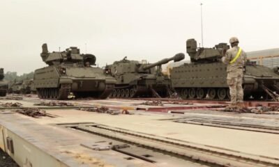 Tanks & fighter jets roll into Washington for Trump’s 79th birthday parade