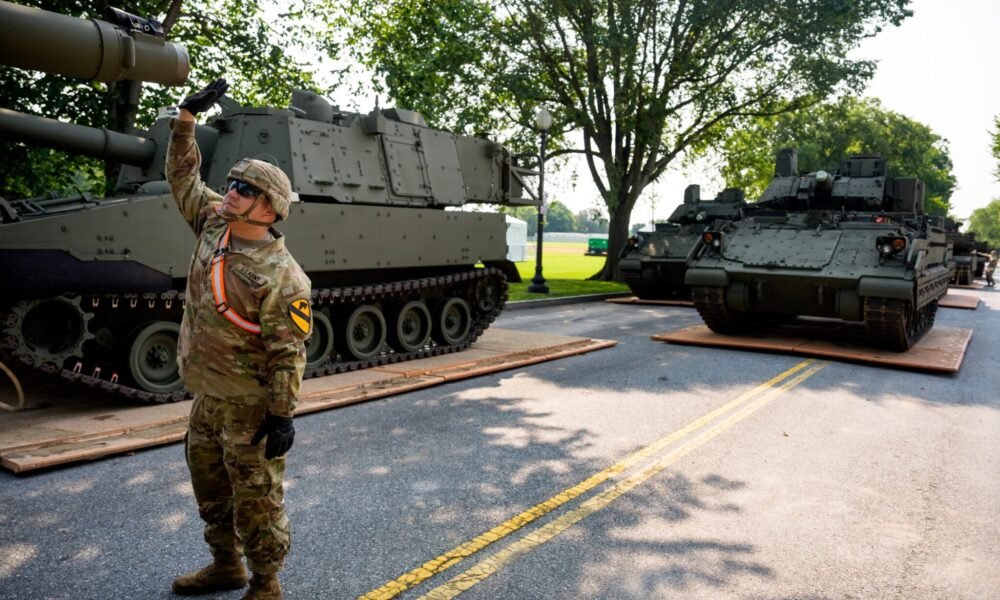 U.S. Army soldiers work on an assortment of M1 Alpha a3 Abrams tanks, stryker armored vehicles, and M2 Bradley fighting vehicles at West Potomac Park along the Potomac River on June 11, 2025 in Washington, D.C. Tanks and other heavy military equipment have arrived in the nation