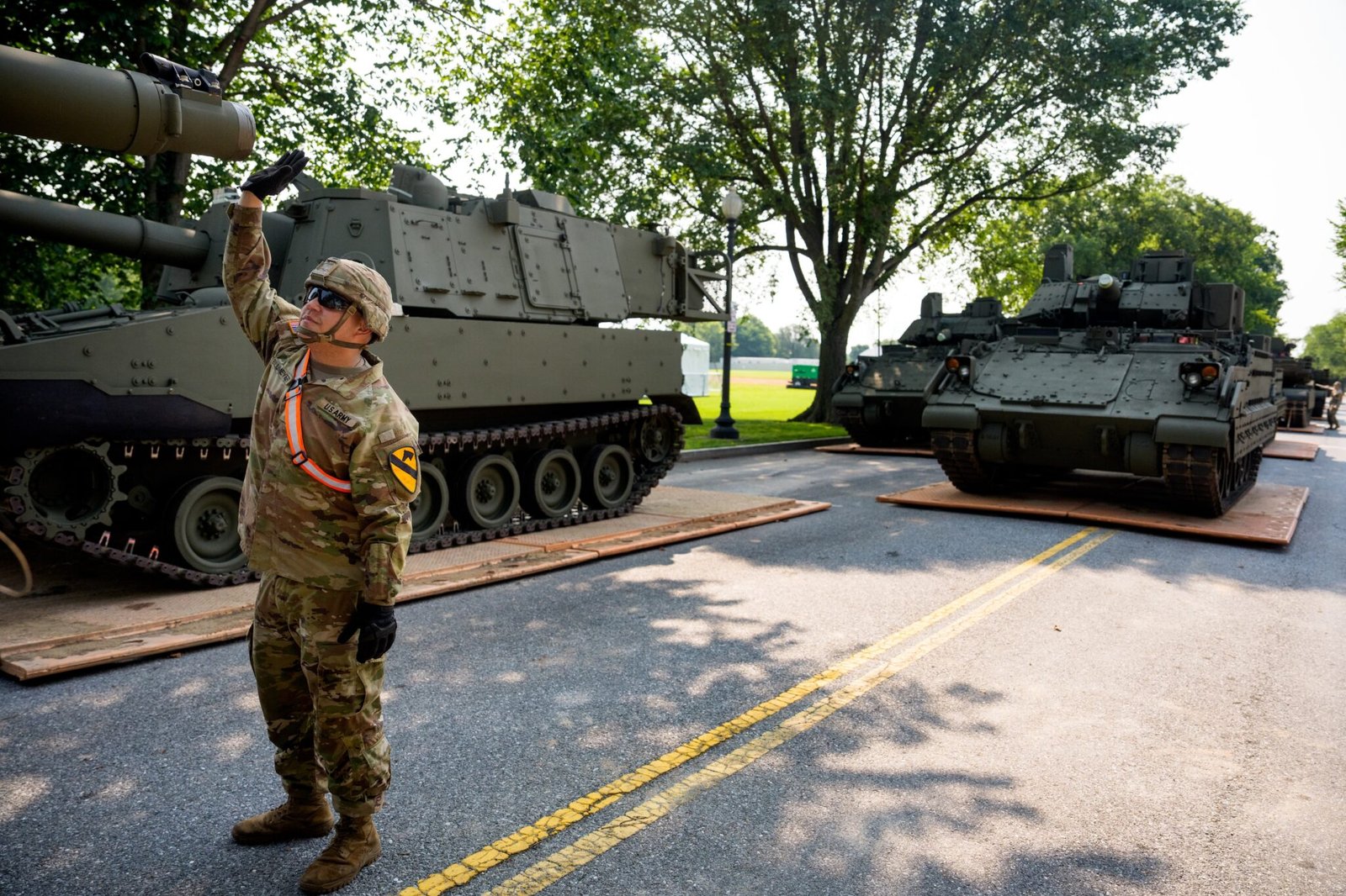 U.S. Army soldiers work on an assortment of M1 Alpha a3 Abrams tanks, stryker armored vehicles, and M2 Bradley fighting vehicles at West Potomac Park along the Potomac River on June 11, 2025 in Washington, D.C. Tanks and other heavy military equipment have arrived in the nation