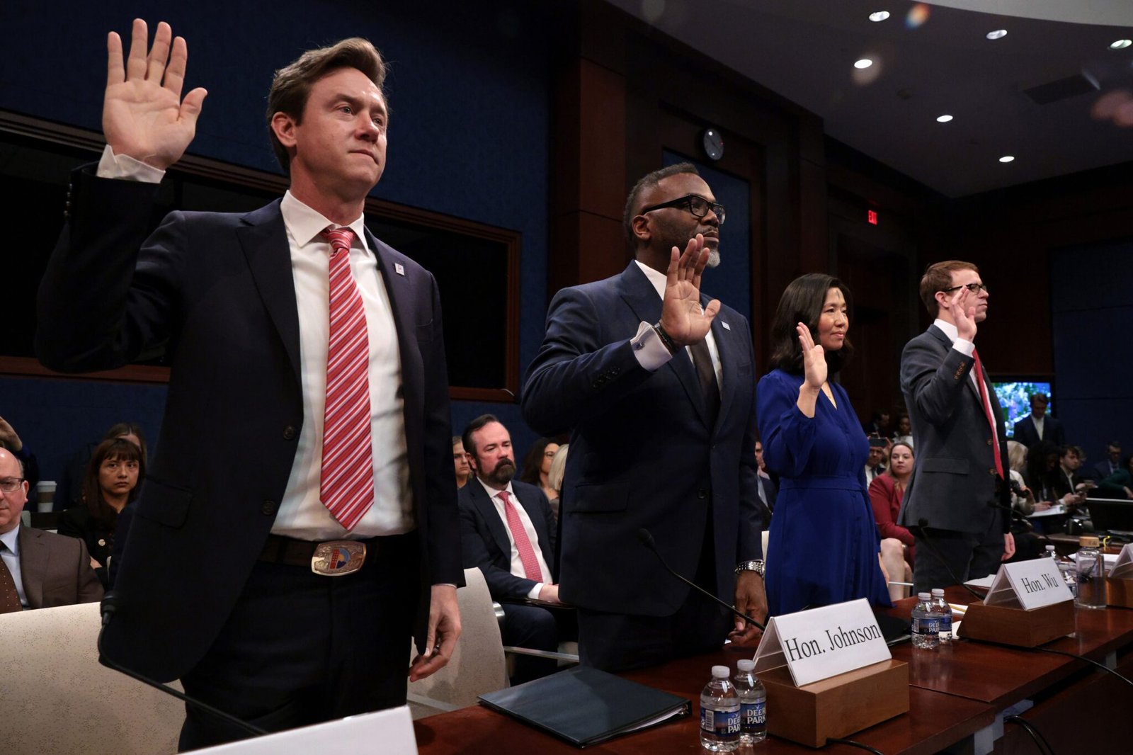 Left to right, Denver Mayor Michael Johnston, Chicago Mayor Brandon Johnson, Boston Mayor Michelle Wu and David J. Bier, director of immigration studies at the Cato Institute, are sworn in during a House Oversight and Government Reform Committee hearing on sanctuary cities' policies at the U.S. Capitol on March 5, 2025 in Washington, D.C. (Photo by Alex Wong/Getty Images)