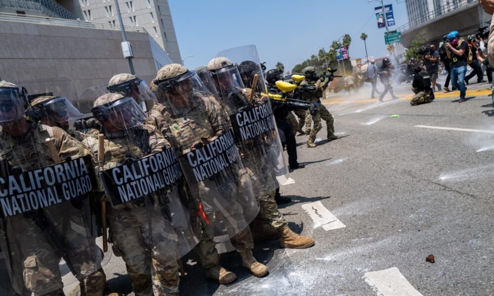 Demonstrators protest outside a downtown jail in Los Angeles following two days of clashes with police during a series of immigration raids on June 8, 2025 in Los Angeles, California. (Photo by Spencer Platt/Getty Images)