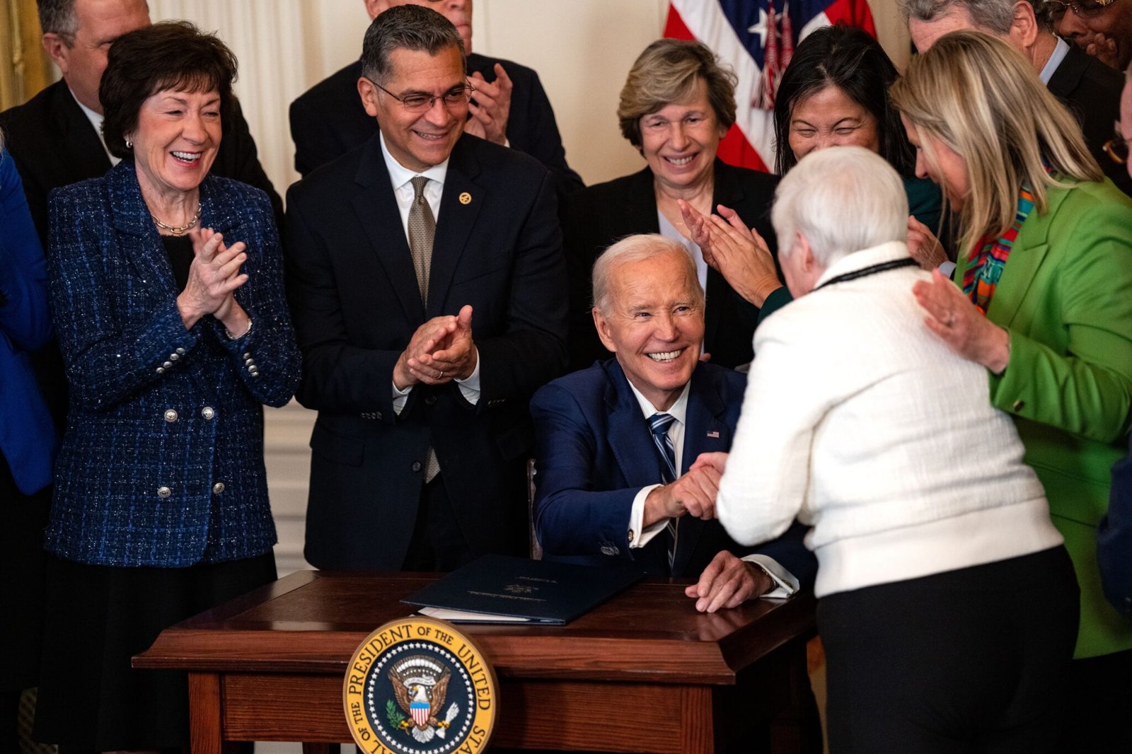 Then-President Joe Biden gives a pen to Bette Marafino, president of the Connecticut Chapter of the Alliance for Retired Americans, after he signed the Social Security Fairness Act during an event in the East Room of the White House on Jan. 5, 2025. (Photo by Kent Nishimura/Getty Images)