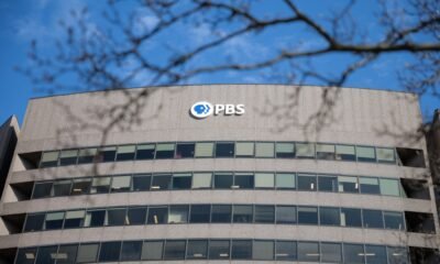 A sign for the Public Broadcasting Service, or PBS,  is seen on its building headquarters on Feb. 18, 2025, in Arlington, Virginia. (Photo by Kayla Bartkowski/Getty Images)