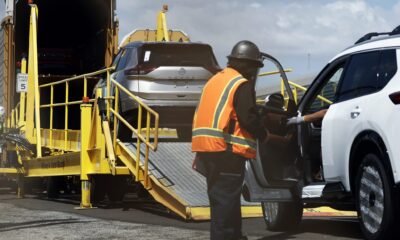 New Nissan cars are driven onto a rail car to be transported from an automobile processing terminal located at the Port of Los Angeles on April 3, 2024, in Wilmington, California.  Tariffs are being levied by President Donald Trump on most foreign vehicles and auto parts.  (Photo by Mario Tama/Getty Images)