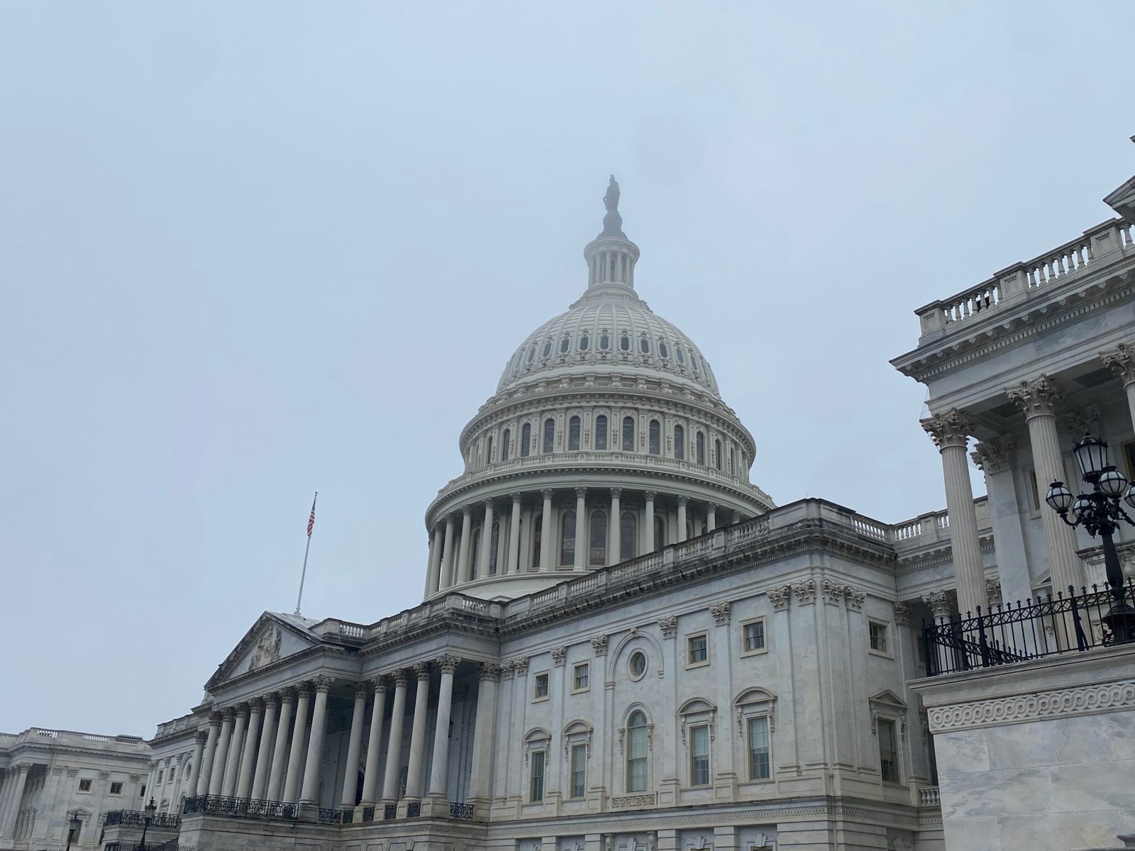 The U.S. Capitol, wrapped in fog, on Dec. 18, 2024. (Photo by Jennifer Shutt/States Newsroom)