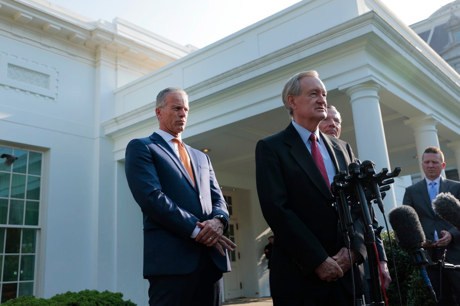 U.S. Senate Majority Leader John Thune, R-S.D., left, listens as Sen. Mike Crapo, R-Idaho, speaks to reporters outside of the West Wing of the White House on June 4, 2025 in Washington, D.C. after a meeting with President Donald Trump. (Photo by Anna Moneymaker/Getty Images)
