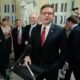 Speaker of the House Mike Johnson, R-La., talks with reporters before heading to the House chamber for a procedural vote on the